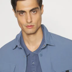 Pier One Poloshirt - Blue -Pier One-Winkel 1d08ac18345944ab9dc0546a5e139ff2 scaled