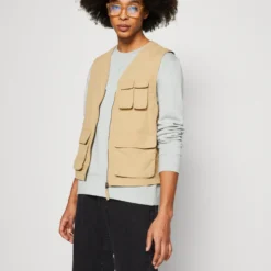 Pier One Bodywarmer - Tan -Pier One-Winkel f195baee9fb6489dbaeb853180d004d6 scaled